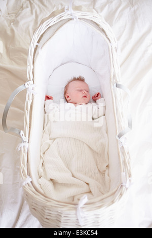 Newborn Baby Girl Sleeping In Cot Stock Photo