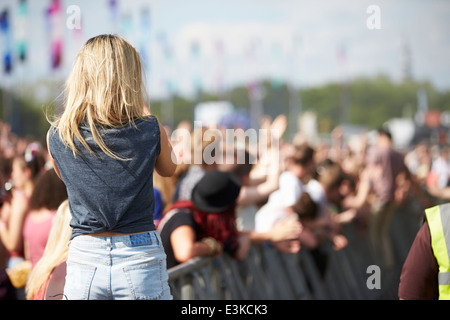 Young Woman At Outdoor Music Festival Stock Photo