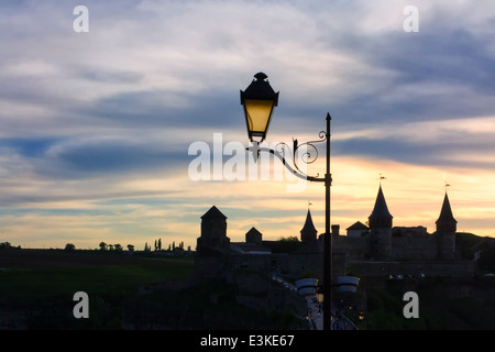 Lantern over Old Medieval Castle (fortress) in evening, Kamyanets-Podilsky, Ukraine Stock Photo