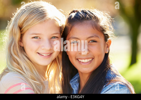 Portrait Of Two Pretty Girls In Countryside Stock Photo