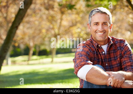 Portrait Of Hispanic Man In Countryside Stock Photo