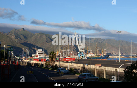 Docks and industrial port at  waterfront of Santa Cruz de Tenerife, Tenerife,  with mountains of Macizo de Anaga north of city Stock Photo