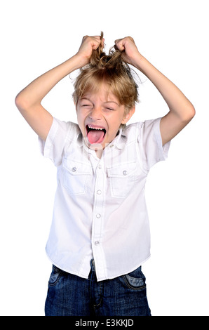 aggressive anger angry annoyed background boy brash child closeup crazy defiant distorted desperate emotion expression face faci Stock Photo