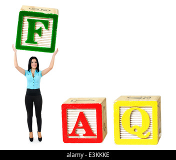 Woman raise letter from word FAQ Stock Photo