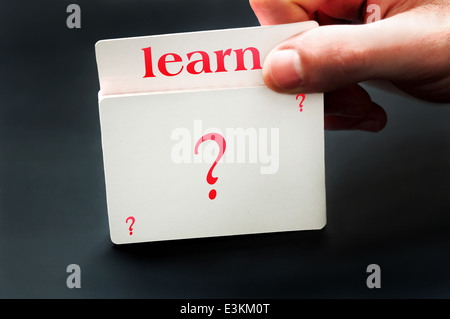 Learn card from question deck of cards Stock Photo