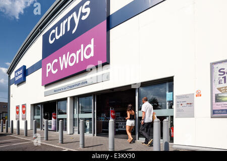 File image: CHIPPENHAM, UK, 23rd June, 2014. Customers enter a Currys PC World store in Chippenham,Wiltshire. Dixons Retail plc will announce it's full year results on Thursday 26th, June, 2014. Credit:  lynchpics/Alamy Live News Stock Photo