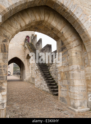 Worn Tower Steps. The very worn stone staircase up to one of the towers on the Valentre Bridge. Stock Photo