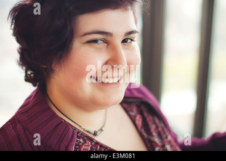 Portrait of young woman smiling, Massachusetts, USA Stock Photo