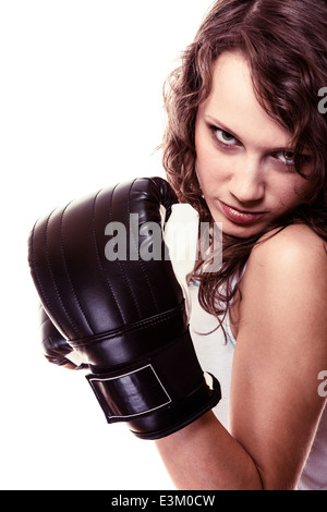 Sport boxer woman in black gloves. Fitness girl training kick boxing. Stock Photo
