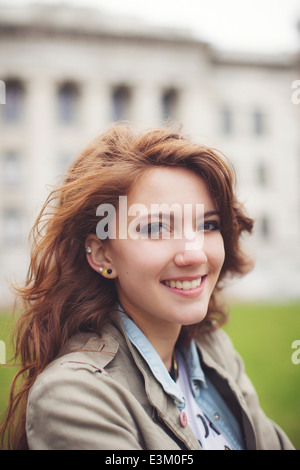 Portrait of young woman smiling Stock Photo