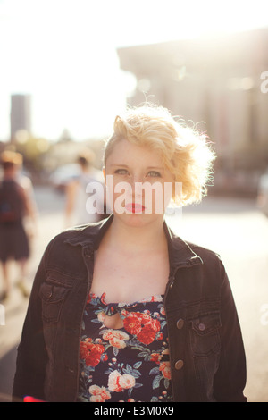 Portrait of young blonde woman looking at camera Stock Photo
