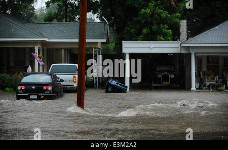 Ft. Worth, Tx, USA. 24th June, 2014. 6/24/2014. Western Avenue, a residential street became a roaring river in front of homes in a neighborhood as thunder storms and heavy rains hit north Texas causing flash flooding in Ft. Worth Tx. Credit:  Ralph Lauer/ZUMAPRESS.com/Alamy Live News Stock Photo