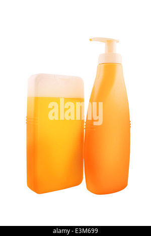 Bottles of sunbath oil or sunscreen isolated on white background with work path saved. Stock Photo