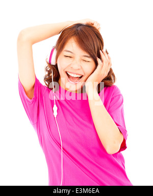 asian woman listening and enjoying music in headphones Stock Photo