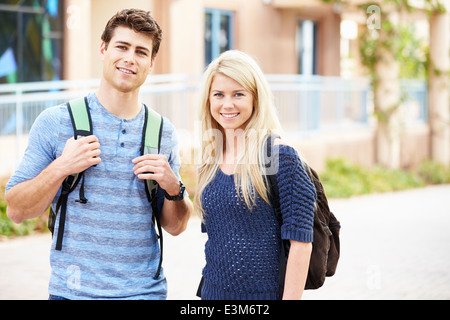 Male And Female University Students Outdoors On Campus Stock Photo