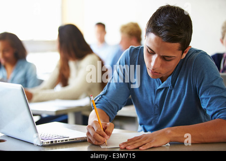 High School Students Taking Test In Classroom Stock Photo