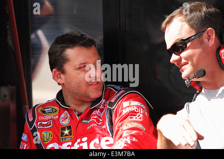 AVONDALE, AZ - OCT 5: Tony Steward (left) and Lance McGrew (right) during a NASCAR Sprint Cup track testing session Stock Photo