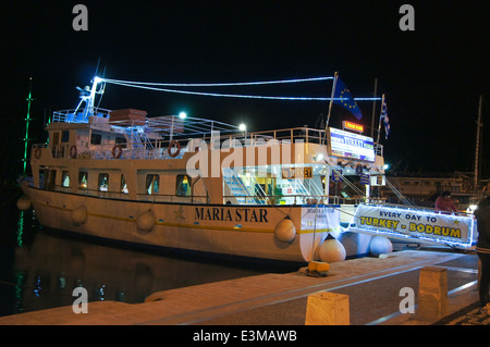 'Maria Star' passenger ferry to Bodrum, Kos harbour, Kos Town, Kos, Greece at night Stock Photo