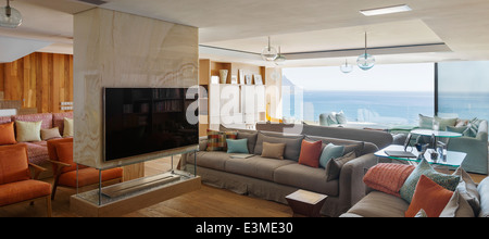 Modern living room with ocean view Stock Photo