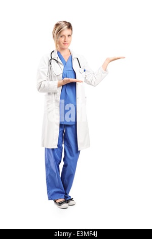 Full length portrait of a female doctor gesturing with hands Stock Photo