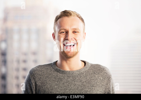Portrait of laughing businessman Stock Photo