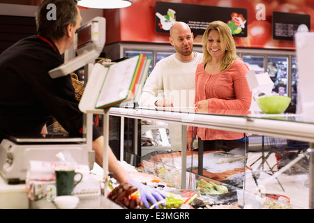 Couple shopping in grocery store Stock Photo