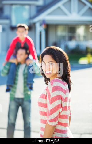 Portrait of smiling woman on street Stock Photo