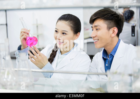 College students doing experiment Stock Photo