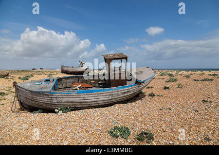 Old fishing boats on Dungeness beach in Kent Stock Photo