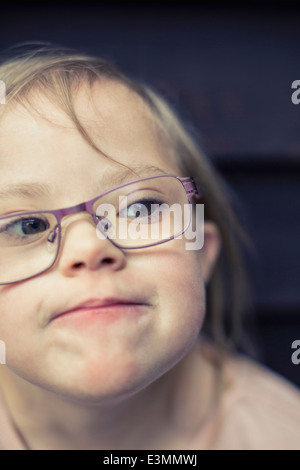 Girl with down syndrome looking away Stock Photo