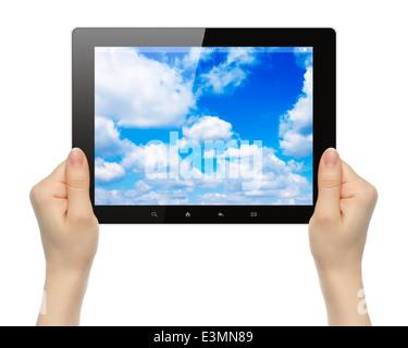 Woman hands holding tablet PC with sky on white background Stock Photo