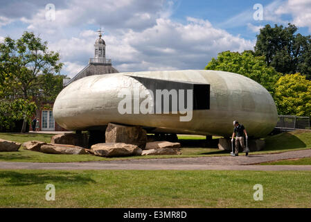 London, UK. 25th June, 2014. Gardener checking the path before the opening of The Serpentine Art Gallery in Hyde park London.Summer Pavilion designed by Smiljan Radic Credit:  Martyn Goddard/Alamy Live News Stock Photo