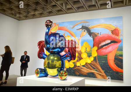The sculpture 'Elephant' and the oil painting 'Lips' by US artist Jeff Koons are on display at the Whitney museum in New York, USA, 24 June 2014. The museum dedicates a large retrospective to the 59-year old artist. Koons is deemed as the world's most expensive living artist. Photo: CHRIS MELZER/dpa Stock Photo