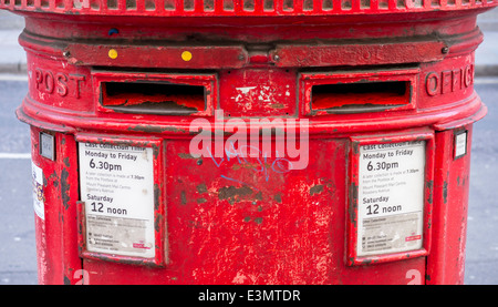 Close -up of Royal Mail Red Post Box. Stock Photo