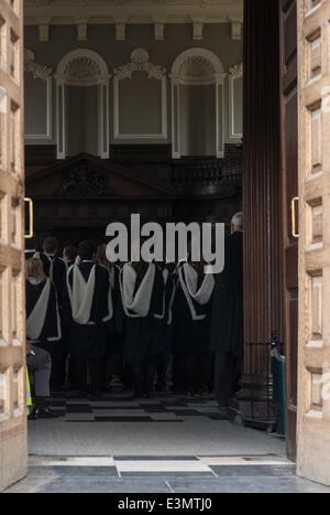 Cambridge, UK. 25th June 2014. Students from Trinity College (Cambridge, England)  in their academic gowns at Senate House for their graduation ceremony on 25 june 2014. Credit:  miscellany/Alamy Live News Stock Photo