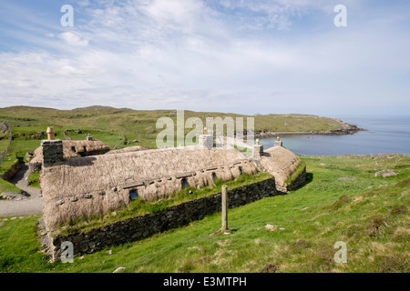 Looking down on restored crofts in Na Gearrannan Blackhouse Village on west coast Garenin Isle of Lewis Outer Hebrides Scotland Stock Photo