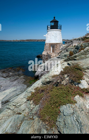 Castle Hill lighthouse was constructed on rocky shore to guide mariners entering Rhode Island's Newport Harbor. Stock Photo