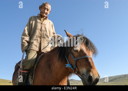 Man on horse in countryside Stock Photo - Alamy
