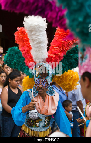 INDIGENOUS DANCE TROUPES from all over MEXICO parade through the streets during  Independence Day in SAN MIGUEL DE ALLENDE Stock Photo