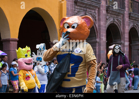 Mexicans dress in costumes and participate the DIA DE LOS LOCOS PARADE - SAN MIGUEL DE ALLENDE, GUANAJUATO, MEXICO Stock Photo