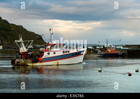 Commerical fishing boat in the harbor of Port en Bessin, Normandy, France Stock Photo