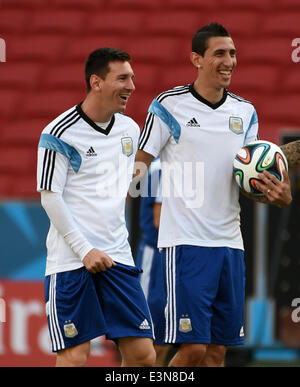 Porto Alegre, Brazil. 24th June, 2014. Argentina's Lionel Messi (L) and Angel Di Maria (R) are seen in a training session at the Estadio Beira-Rio Stadium ahead of a Group F match between Argentina and Nigeria of 2014 FIFA World Cup, in Porto Alegre, Brazil, June 24, 2014. Credit:  Li Ga/Xinhua/Alamy Live News Stock Photo