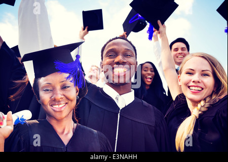 Diverse International Students Celebrating Graduation Stock Photo