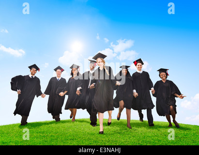 Group Of Diverse International Students Celebrating Graduation Stock Photo