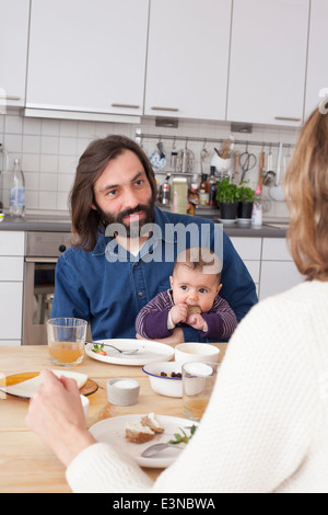 Family having breakfast at home Stock Photo