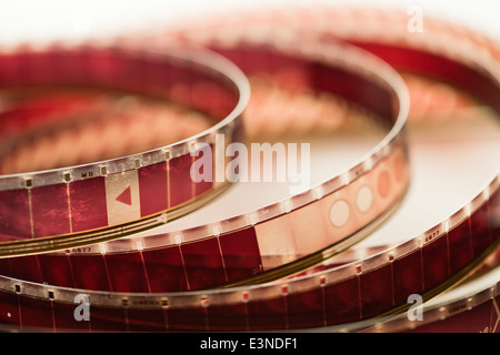 Old motion picture film reel on brown background Stock Photo - Alamy