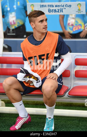 France's Antoine Griezmann sits on the bench during the FIFA World Cup 2014 group E preliminary round match between Switzerland and France at the Arena Fonte Nova Stadium in Salvador da Bahia, Brazil, 20 June 2014. Photo: Marius Becker/dpa Stock Photo