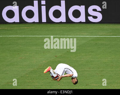 Fortaleza, Brazil. 21st June, 2014. Germany's Miroslav Klose celebrates after scoring the 2-2 during the FIFA World Cup 2014 group G preliminary round match between Germany and Ghana at the Estadio Castelao Stadium in Fortaleza, Brazil, 21 June 2014. Photo: Marcus Brandt/dpa/Alamy Live News Stock Photo