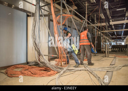 Berlin, Germany. 23rd June, 2014. Cables lie on the floor at Berlin Brandenburg Airport in Berlin, Germany, 23 June 2014. After problems with the fire safety systems, the date for the opening of the airport is still no where in site. Photo: MICHAEL KAPPELER/dpa/Alamy Live News Stock Photo