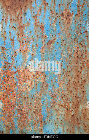 Brown rust with peeling blue paint on old metal fence Stock Photo - Alamy
